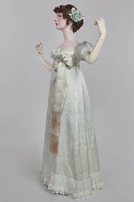 Lot 62 - An eau de Nil satin evening dress, probably French, 1807-1809