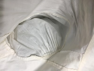 Lot 57 - A white percale redingote, French, 1808-12