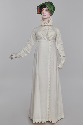 Lot 57 - A white percale redingote, French, 1808-12