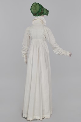 Lot 57 - A white percale redingote, French, 1808-12
