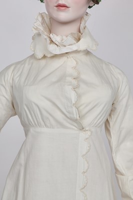Lot 57 - A white percale redingote, French, 1808-12