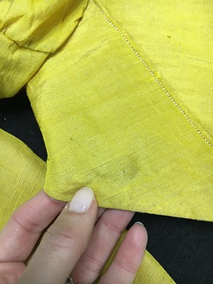 Lot 114 - A yellow silk twill gros de Tours silk spencer, probably English, 1815-17