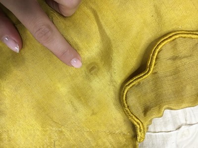 Lot 114 - A yellow silk twill gros de Tours silk spencer, probably English, 1815-17