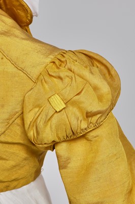 Lot 114 - A yellow silk twill gros de Tours silk spencer, probably English, 1815-17