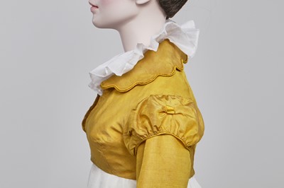 Lot 114 - A yellow silk twill gros de Tours silk spencer, probably English, 1815-17