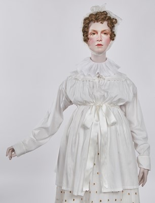 Lot 85 - A rare white piqué cotton pregnancy jacket, French, 1810-13