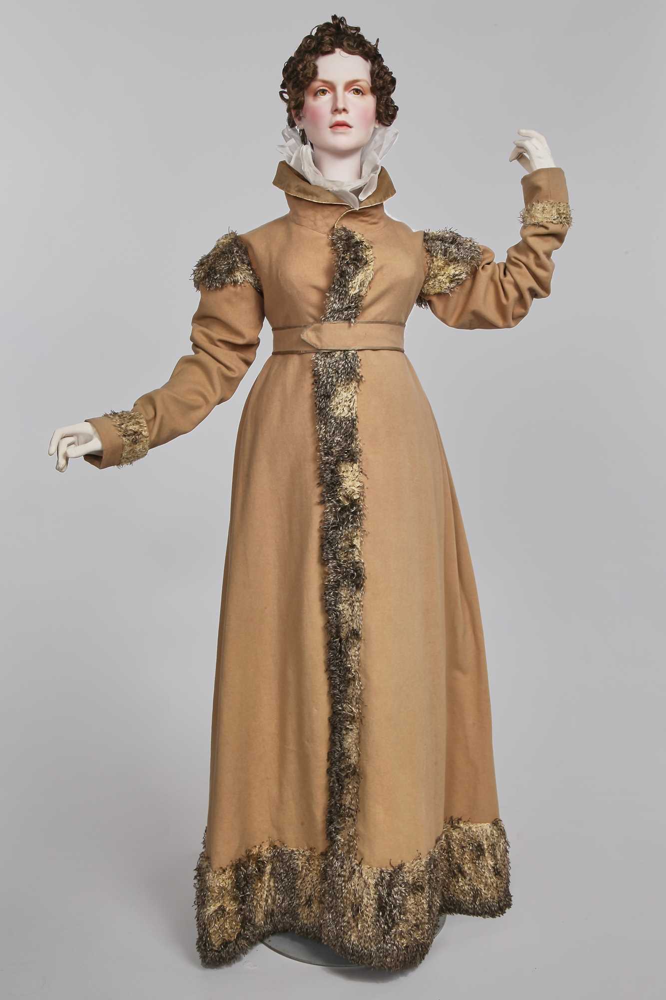 Lot 116 - A fine wool redingote with faux fur (silk shag) trim, French, 1815-20