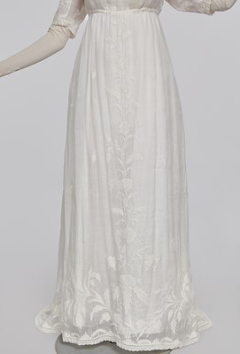 Lot 41 - A whitework embroidered muslin dress with trained hem, French, circa 1803