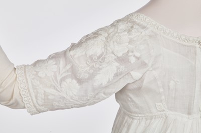 Lot 41 - A whitework embroidered muslin dress with trained hem, French, circa 1803