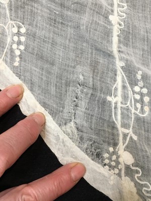 Lot 34 - A whitework embroidered muslin evening gown with long trained hem, French, 1800-04