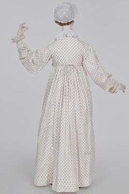 Lot 99 - A sprigged cotton morning dress, English, circa 1813