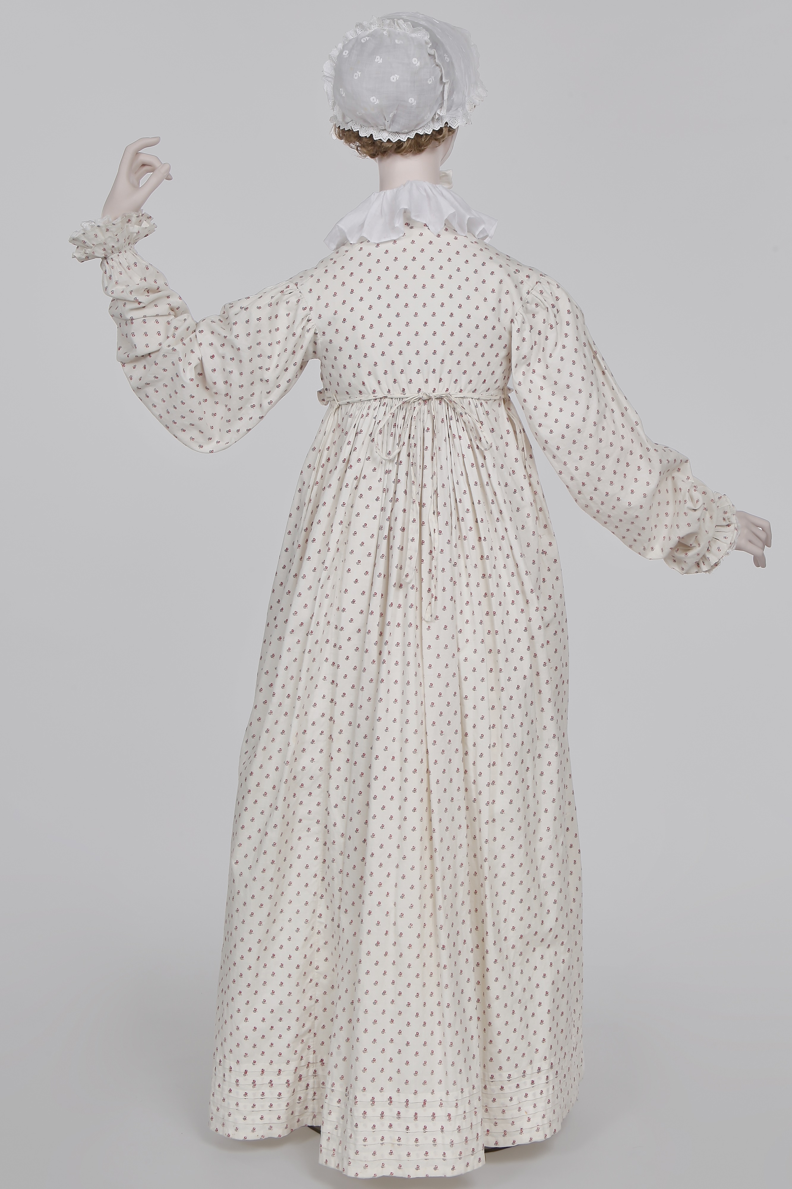 Lot 99 - A sprigged cotton morning dress, English,