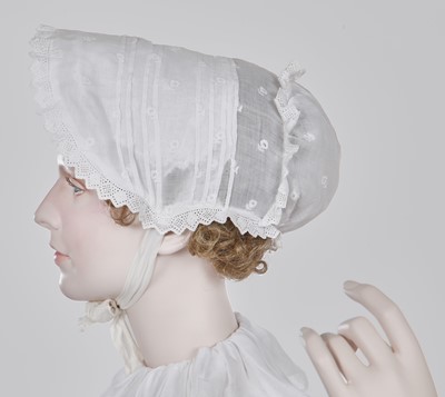 Lot 99 - A sprigged cotton morning dress, English, circa 1813