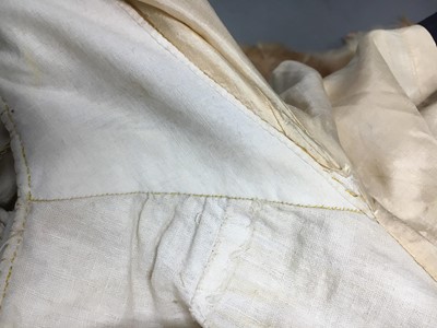 Lot 111 - A pale apricot sarsanet redingote/pelisse, French, circa 1815