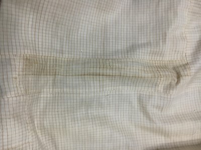 Lot 111 - A pale apricot sarsanet redingote/pelisse, French, circa 1815