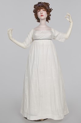 Lot 32 - An embroidered white linon dress, French, 1800-1803