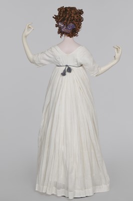 Lot 32 - An embroidered white linon dress, French, 1800-1803