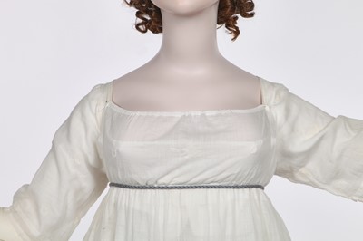 Lot 32 - An embroidered white linon dress, French, 1800-1803