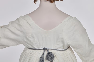 Lot 32 - An embroidered white linon dress, French, 1800-1803