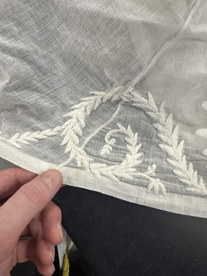 Lot 37 - A fine white muslin gown with long train, French, circa 1803