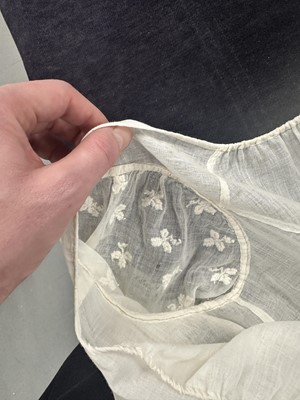 Lot 37 - A fine white muslin gown with long train, French, circa 1803