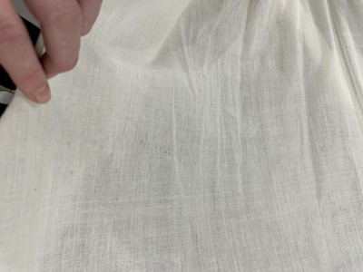 Lot 37 - A fine white muslin gown with long train, French, circa 1803