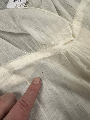 Lot 37 - A fine white muslin gown with long train, French, circa 1803
