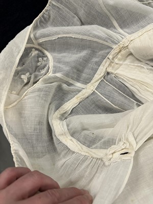 Lot 37 - A fine white muslin gown with long train, French, circa 1803