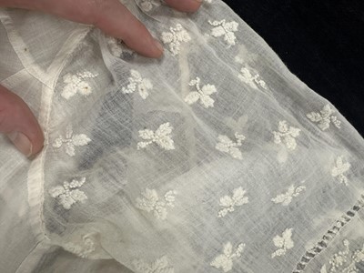 Lot 37 - A fine white muslin gown with long train, French, circa 1803