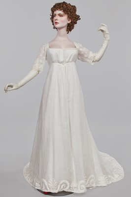 Lot 37 - A fine white muslin gown with long train, French, circa 1803