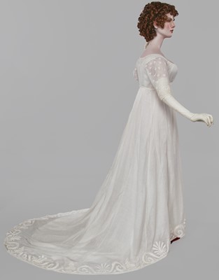 Lot 37 - A fine white muslin gown with long train, French, circa 1803