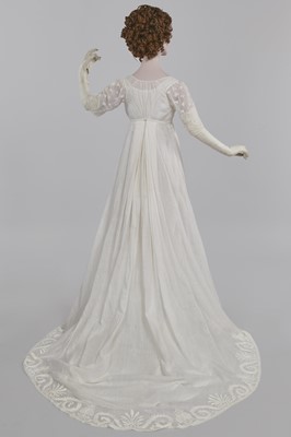 Lot 37 - A fine white muslin gown with long train, French, circa 1803