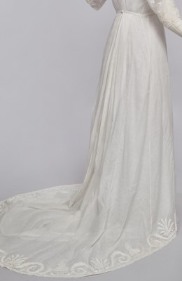 Lot 37 - A fine white muslin gown with long train, French, circa 1803