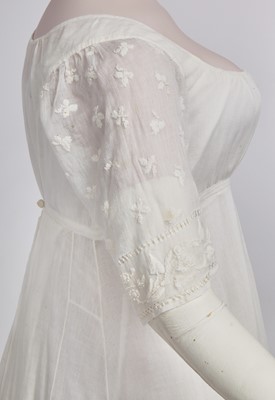 Lot 37 - A fine white muslin gown with long train, French, circa 1803