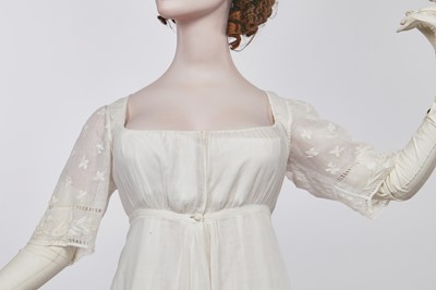 Lot 37 - A fine white muslin gown with long train, French, circa 1803