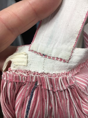 Lot 50 - A pink and white striped cotton cambric spencer and petticoat, English, circa 1807-09
