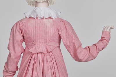 Lot 50 - A pink and white striped cotton cambric spencer and petticoat, English, circa 1807-09