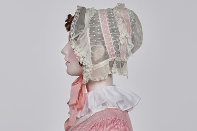 Lot 50 - A pink and white striped cotton cambric spencer and petticoat, English, circa 1807-09