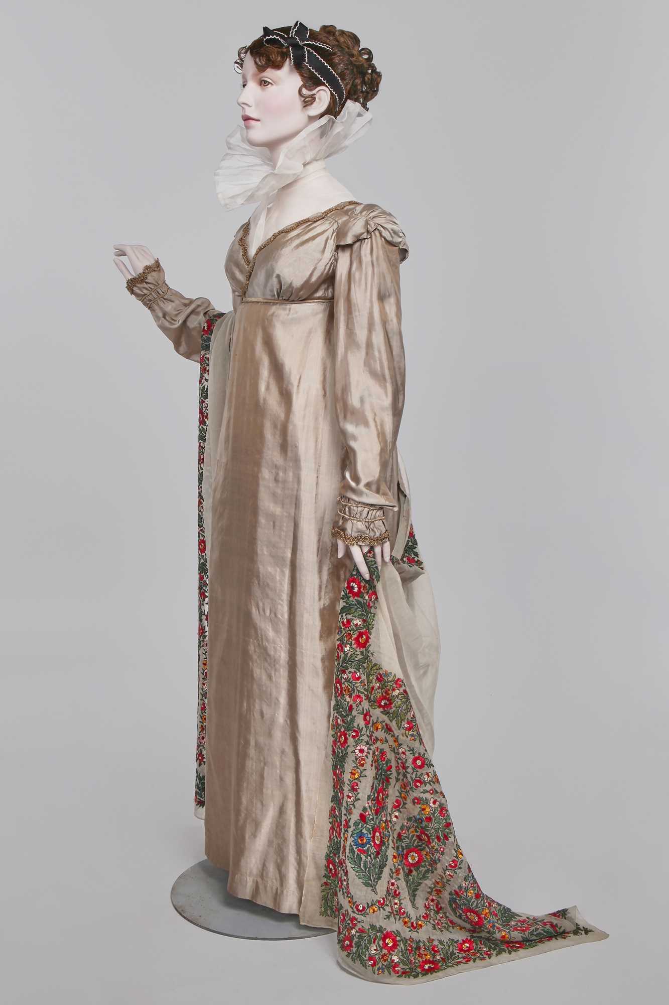 Lot 95 - A taupe twill shot sarsanet evening dress, circa 1812