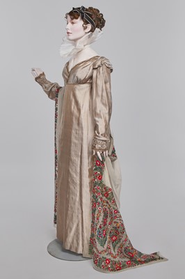 Lot 95 - A taupe twill shot sarsanet evening dress, circa 1812