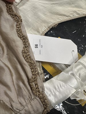 Lot 95 - A taupe twill shot sarsanet evening dress, circa 1812