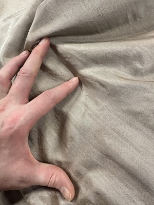 Lot 95 - A taupe twill shot sarsanet evening dress, circa 1812