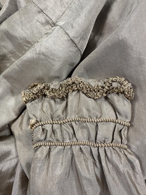 Lot 95 - A taupe twill shot sarsanet evening dress, circa 1812