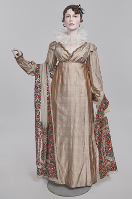 Lot 95 - A taupe twill shot sarsanet evening dress, circa 1812