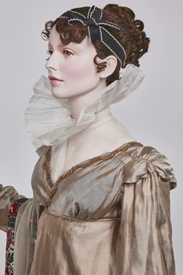 Lot 95 - A taupe twill shot sarsanet evening dress, circa 1812