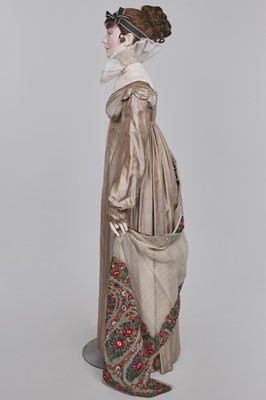 Lot 95 - A taupe twill shot sarsanet evening dress, circa 1812
