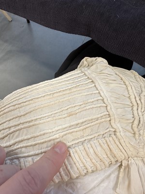 Lot 98 - A white muslin spencer, English, 1813-1815