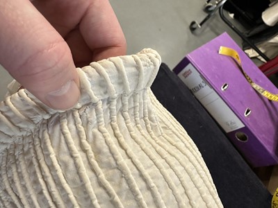 Lot 98 - A white muslin spencer, English, 1813-1815