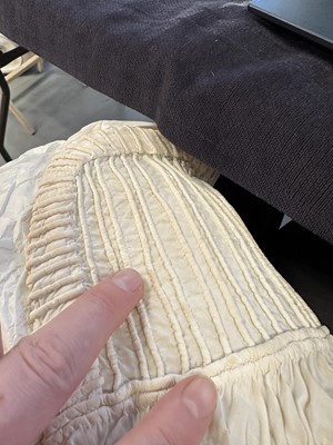 Lot 98 - A white muslin spencer, English, 1813-1815