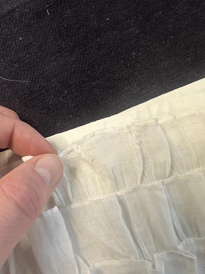 Lot 98 - A white muslin spencer, English, 1813-1815